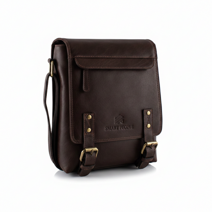 Altair - A dark brown leather crossbody bag with brass hardware, featuring a front flap pocket and adjustable side straps, shown on a clean white background