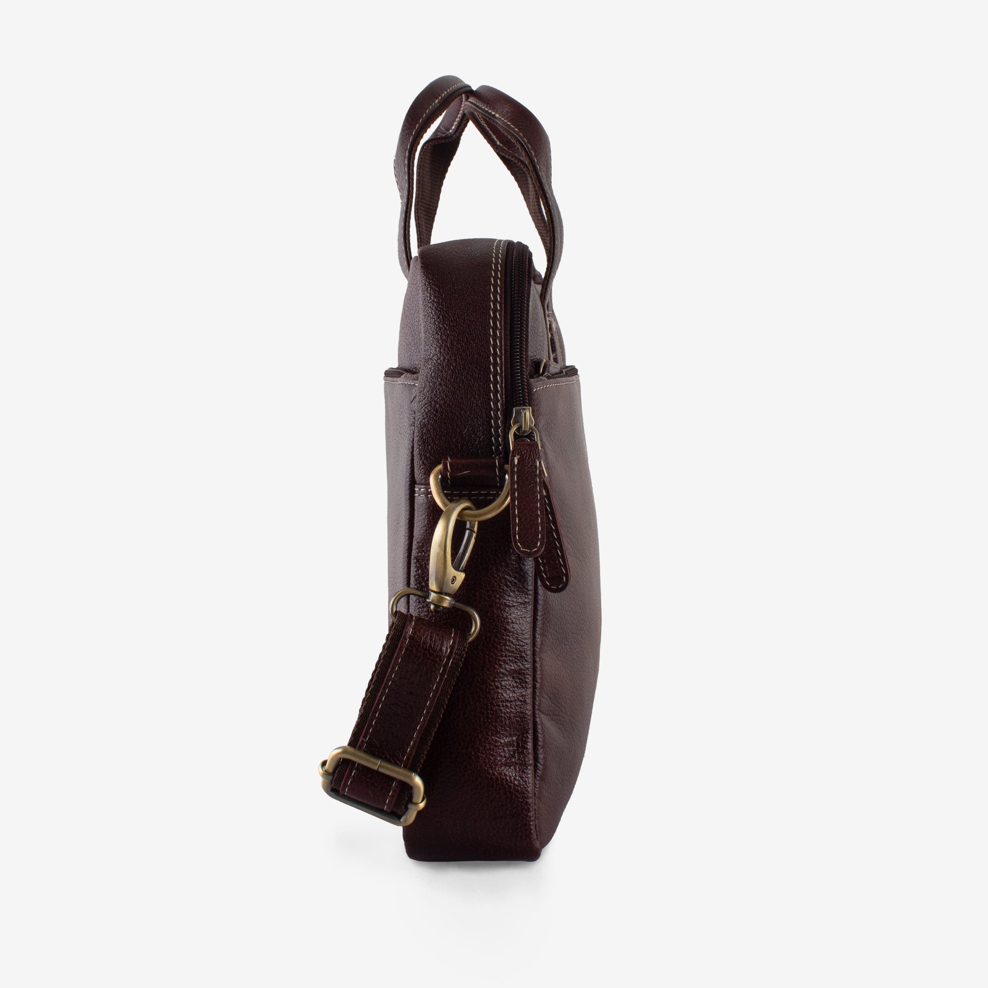 Brown leather bag with gold hardware on a white background